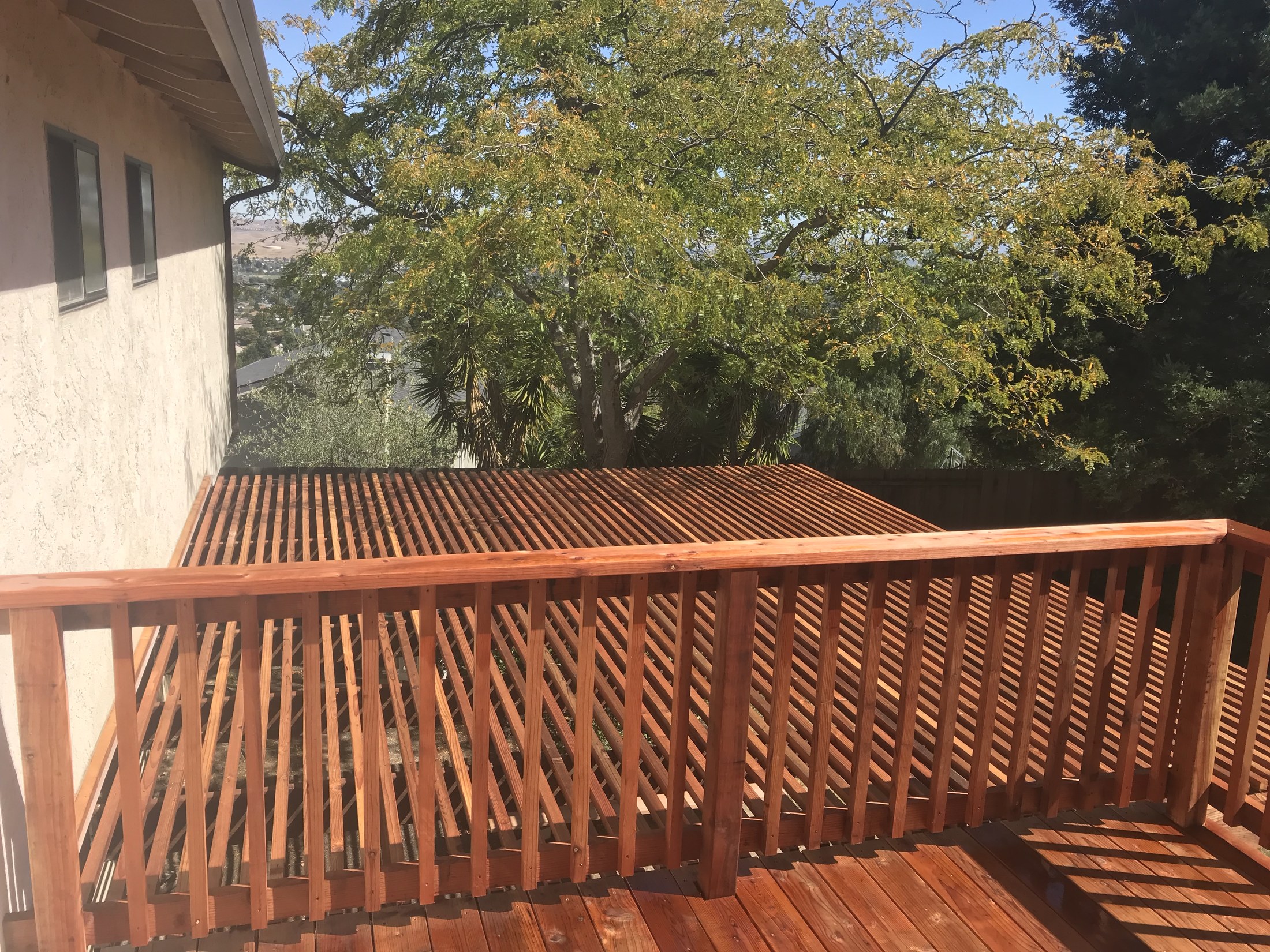Completed elevated deck and shade structure by 360 Construction JN