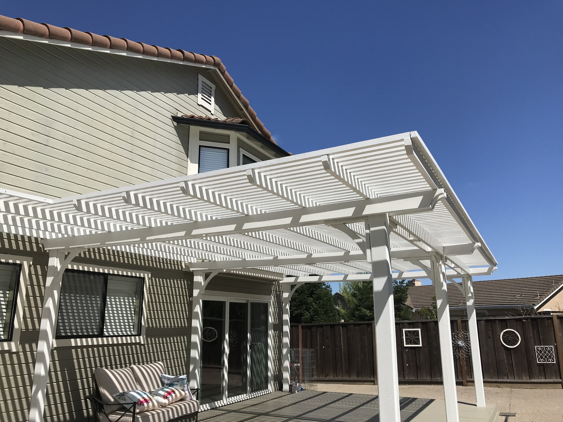 Completed pergola with exterior patio shade by 360 Construction JN