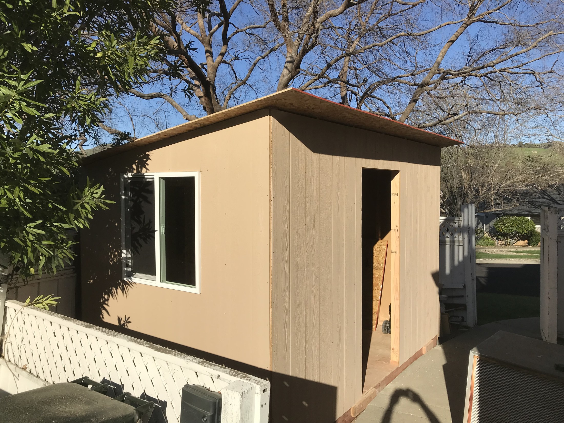 Shed build process: siding and roof sheathing by 360 Construction JN