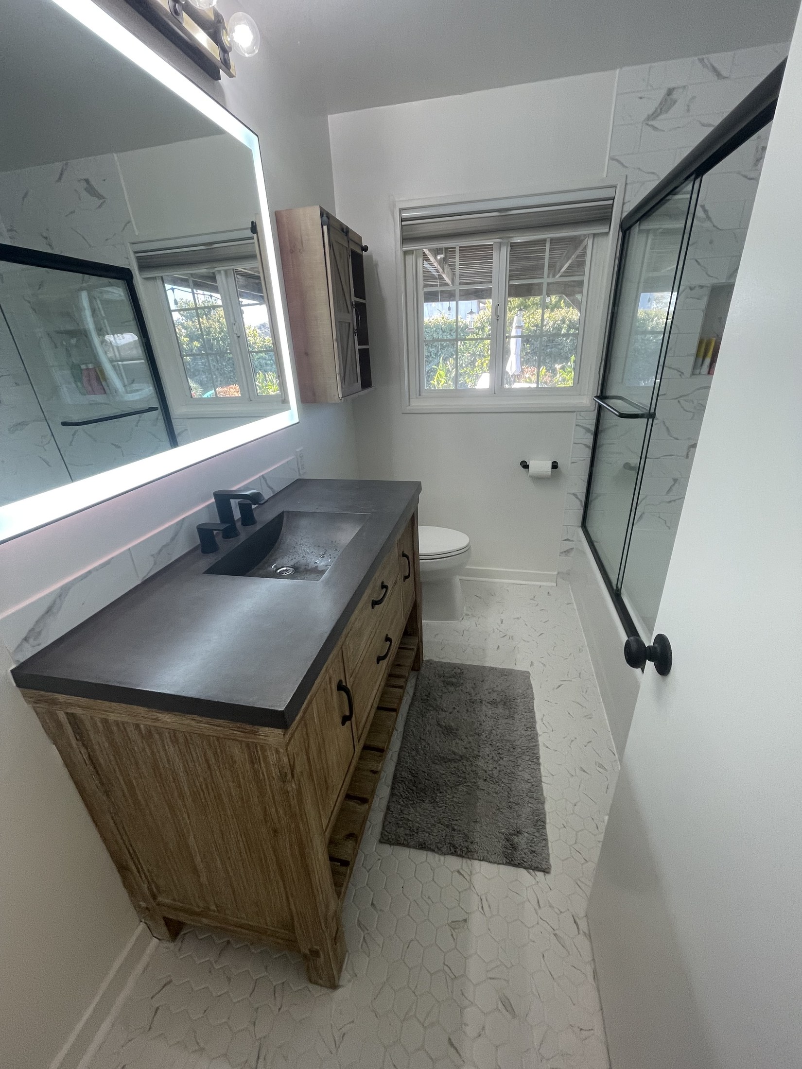 Bathroom after remodel by 360 Construction JN