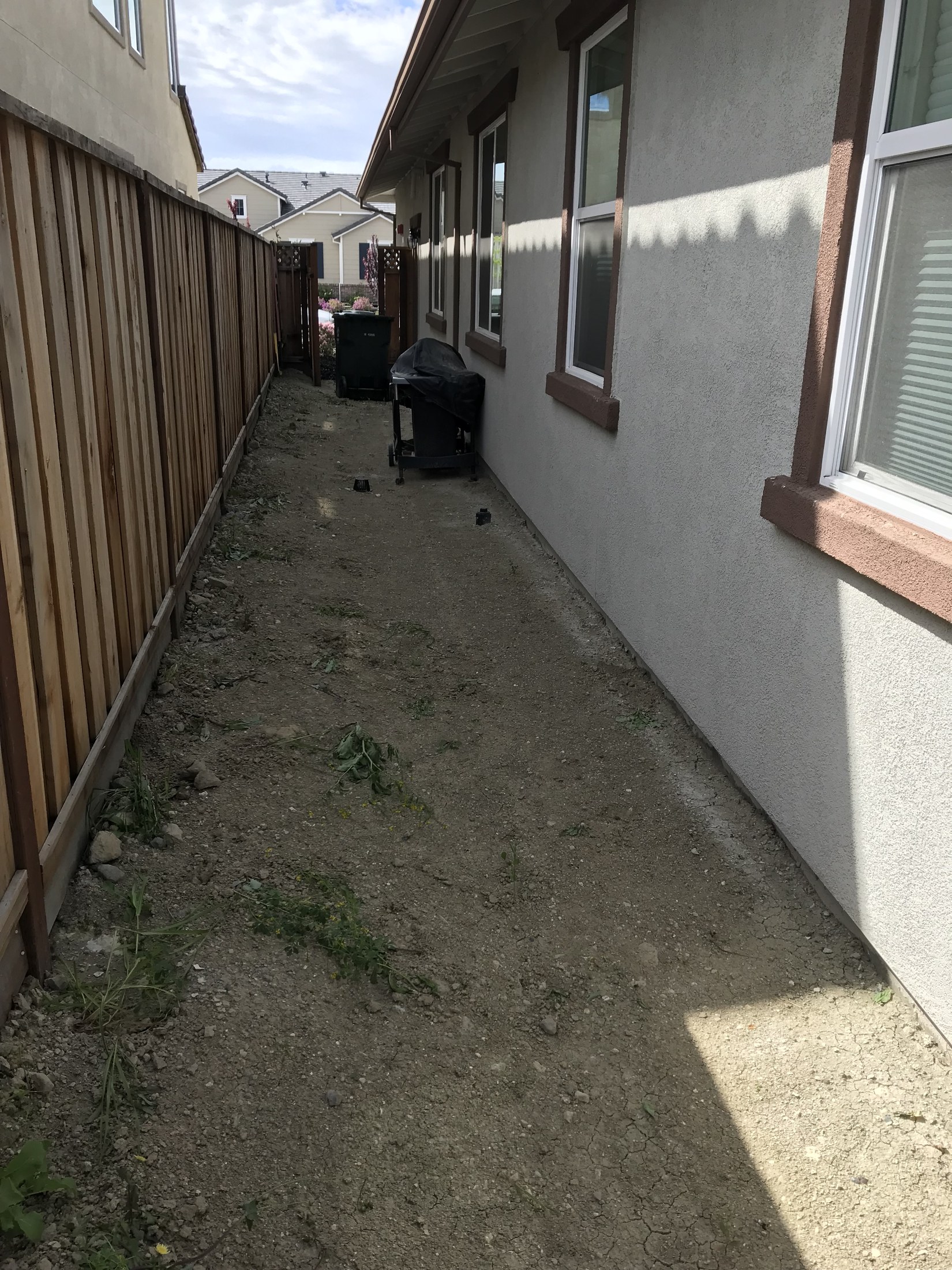 Side-yard walkway before concrete work by 360 Construction JN