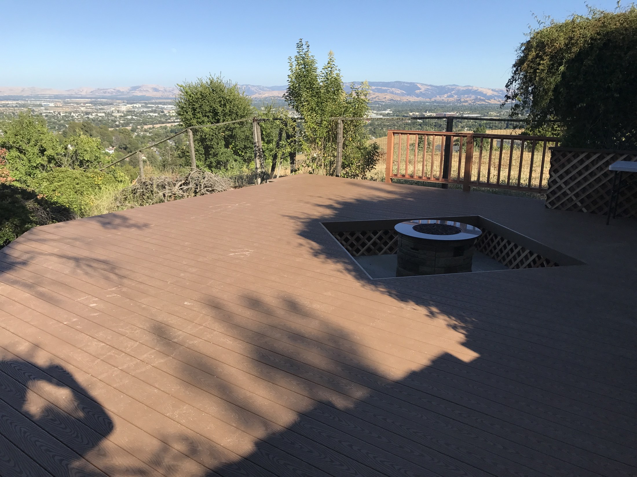 Completed deck with railing and view by 360 Construction JN